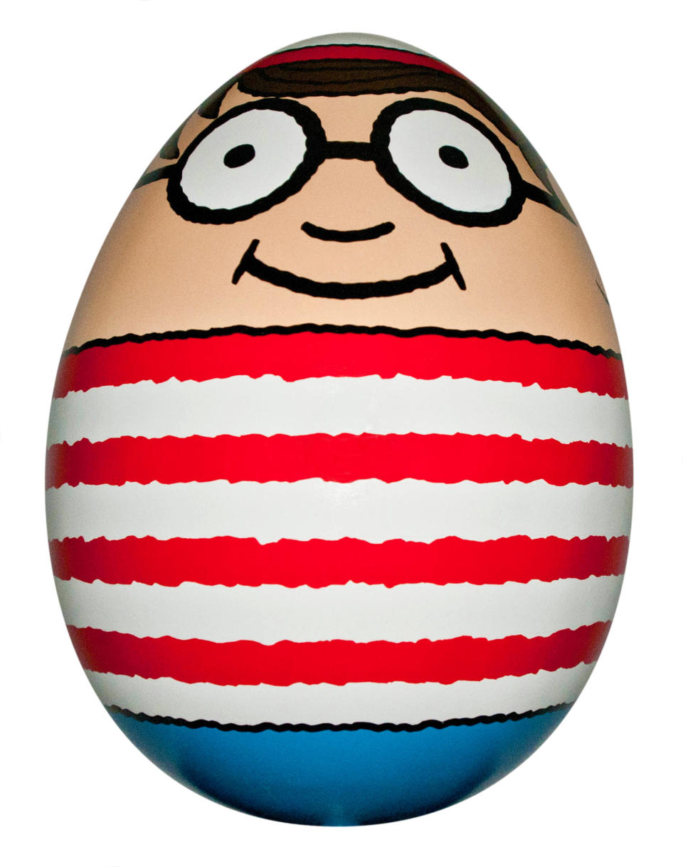 This undated image provided by HL Group shows an egg designed by Martin Handford, the creator of “Where’s Waldo.” The egg will be among 275 eggs hidden around New York City April 1-17, 2014. The public will be invited to find the over 2 feet tall eggs as part of an interactive contest called The Faberge Big Egg Hunt. (AP Photo/HL Group, Maverick Inman)