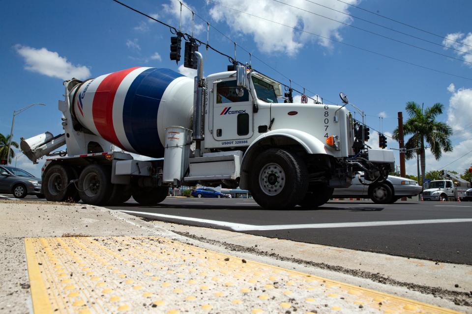 Big construction trucks like this one are not helping the traffic flow in Southwest Florida. The region is still in recovery from Hurricane Ian and cement mixers and dump trucks are common on roads.