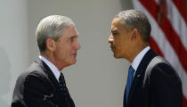 <p>President Barack Obama, right, with outgoing FBI Director Robert Mueller, left, during Obama’s announcement at he will nominate James Comey, a senior Justice Department official under President George W. Bush, to replace Mueller, as director of the F.B.I., in the Rose Garden of the White House on Friday, June 21, 2013, in Washington. (Photo: Pablo Martinez Monsivais/AP) </p>