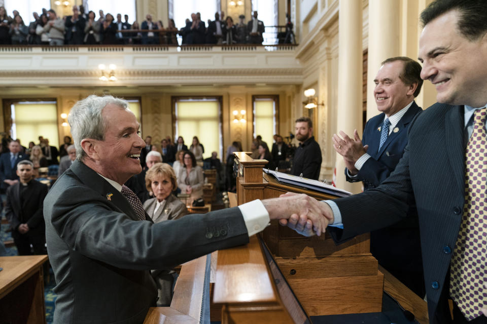 FILE - New Jersey Gov. Phil Murphy meets with Senate President Nicholas Scutari, right, and Assembly Speaker Craig Coughlin, second right, before he delivers his State of the State address to a joint session of the Legislature at the statehouse, in Trenton, N.J., Tuesday, Jan. 10, 2023. New Jersey wraps up voting Tuesday, Nov. 7, 2023, for a new Legislature, with all 120 seats on the ballot, as Republicans fight for controlling either chamber for the first time in more than two decades. (AP Photo/Matt Rourke, File)