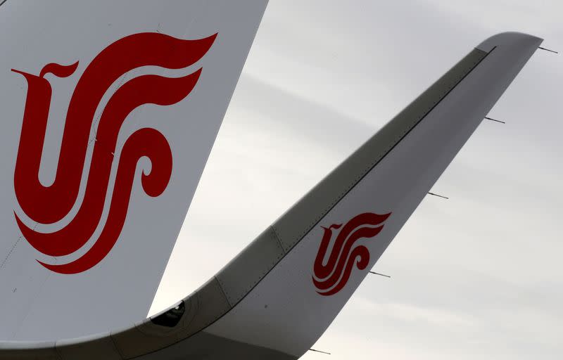 The logo of Air China is pictured on a tail on an airplane parked at the aircraft builder's headquarters of Airbus in Colomiers near Toulouse