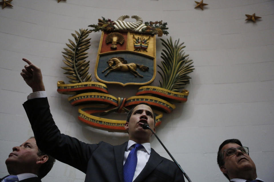 Opposition leader Juan Guaido speaks at the National Assembly in Caracas, Venezuela, Tuesday, Jan. 7, 2020. Guaidó and lawmakers who back him, pushed their way into the legislative building on Tuesday following an attempt by rival legislators to take control of the congress, and declared Guaidó the president of the only opposition-controlled institution. (AP Photo/Andrea Hernandez Briceño)