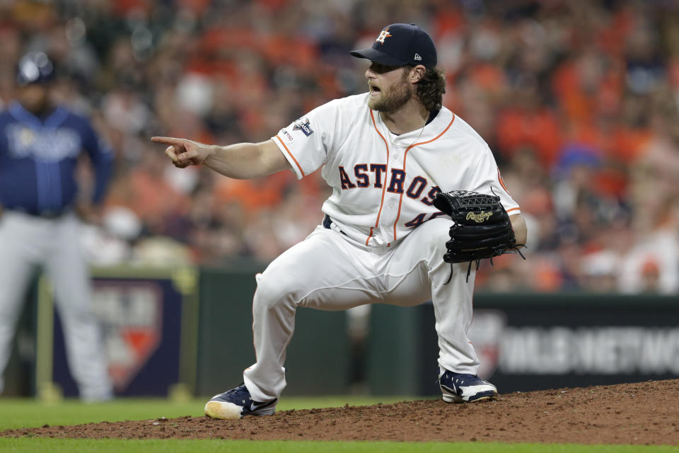 Houston Astros starting pitcher Gerrit Cole reacts to a call during the eighth inning of Game 2 of the baseball team's American League Division Series against the Tampa Bay Rays in Houston, Saturday, Oct. 5, 2019. (AP Photo/Michael Wyke)