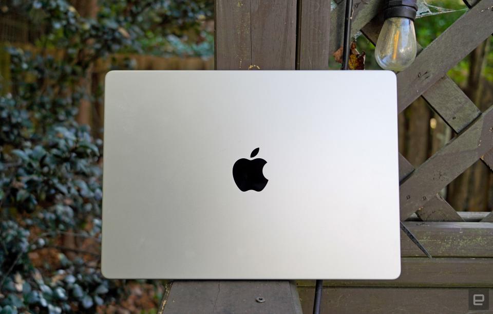 <p>Apple MacBook Pro 14-inch from the rear, showing off the Apple logo.</p>
