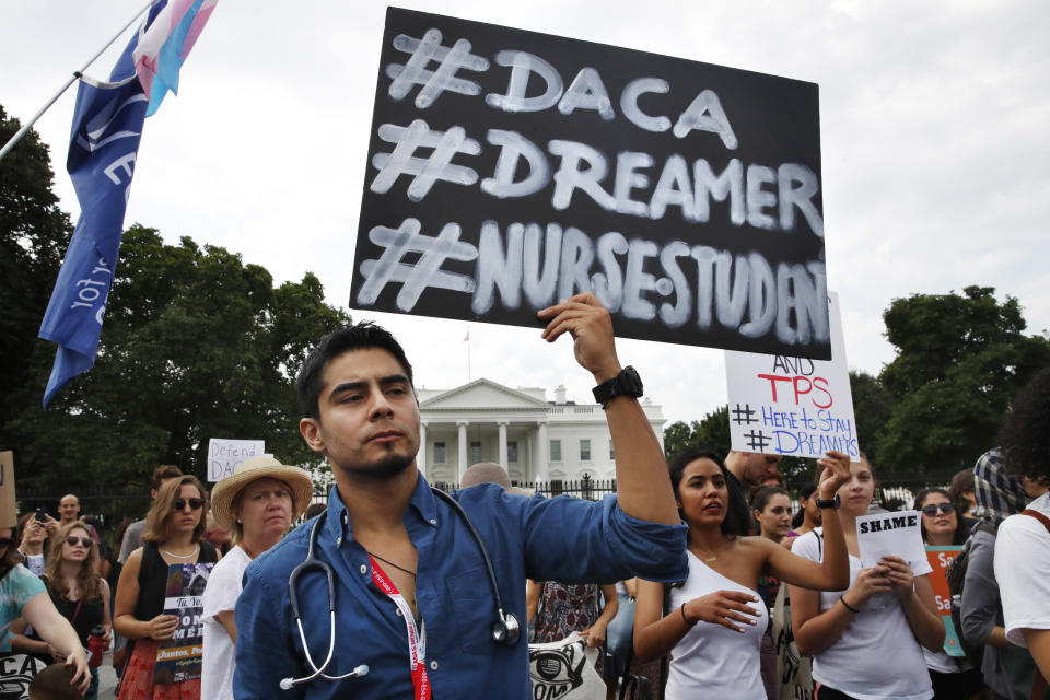 <p>Carlos Esteban, 31, of Woodbridge, Va., a nursing student and recipient of Deferred Action for Childhood Arrivals, known as DACA, rallies with others in support of DACA outside of the White House, in Washington, Tuesday, Sept. 5, 2017. (Photo: Jacquelyn Martin/AP) </p>