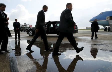 U.S. President Barack Obama walks toward Air Force One upon his departure from Stansted Airport in Stansted, Britain April 24, 2016. REUTERS/Kevin Lamarque