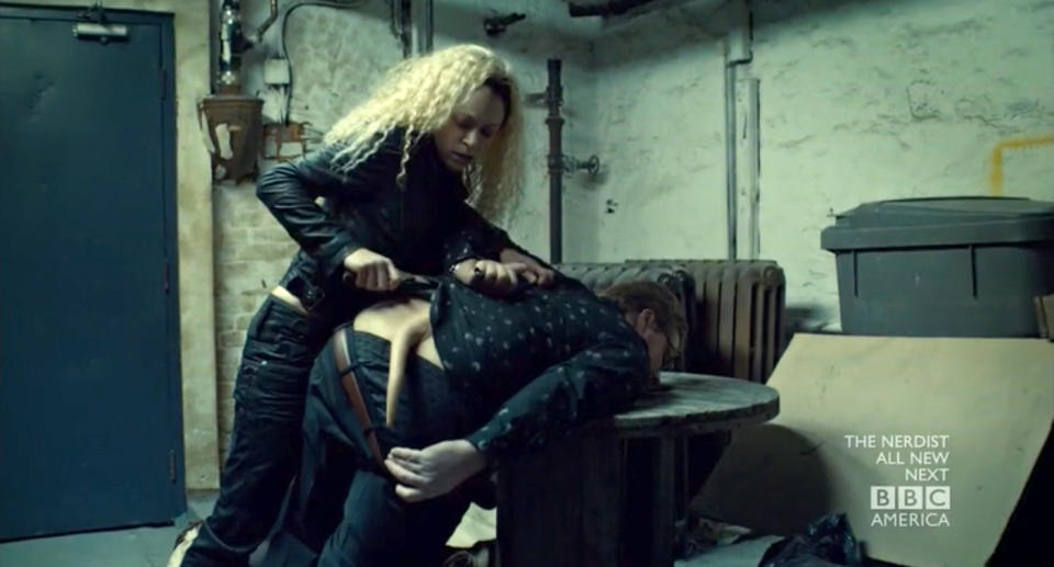 Helena cuts off Olivier's tail.