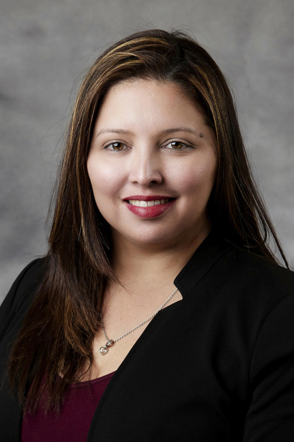 This Aug. 19, 2019 photo provided by the University of Nevada, Las Vegas shows Patricia Navarro Velez, 39, an accounting professor who was one of three victims shot and killed Wednesday, ec. 6, 2023 on campus. (Jenny Mann/UNLV via AP)