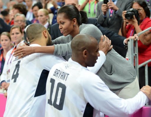 US centre Tyson Chandler is congratulated by First Lady Michelle Obama at the London 2012 Olympic Games. With charm, hidden steel and growing political skill, Michelle Obama is injecting a timely jolt of verve into her husband's battered political brand