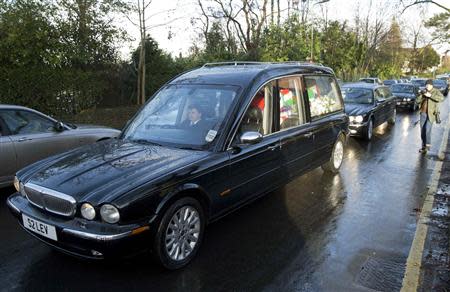 The funeral cortege of Ronnie Biggs is seen in north London January 3, 2014. REUTERS/Neil Hall