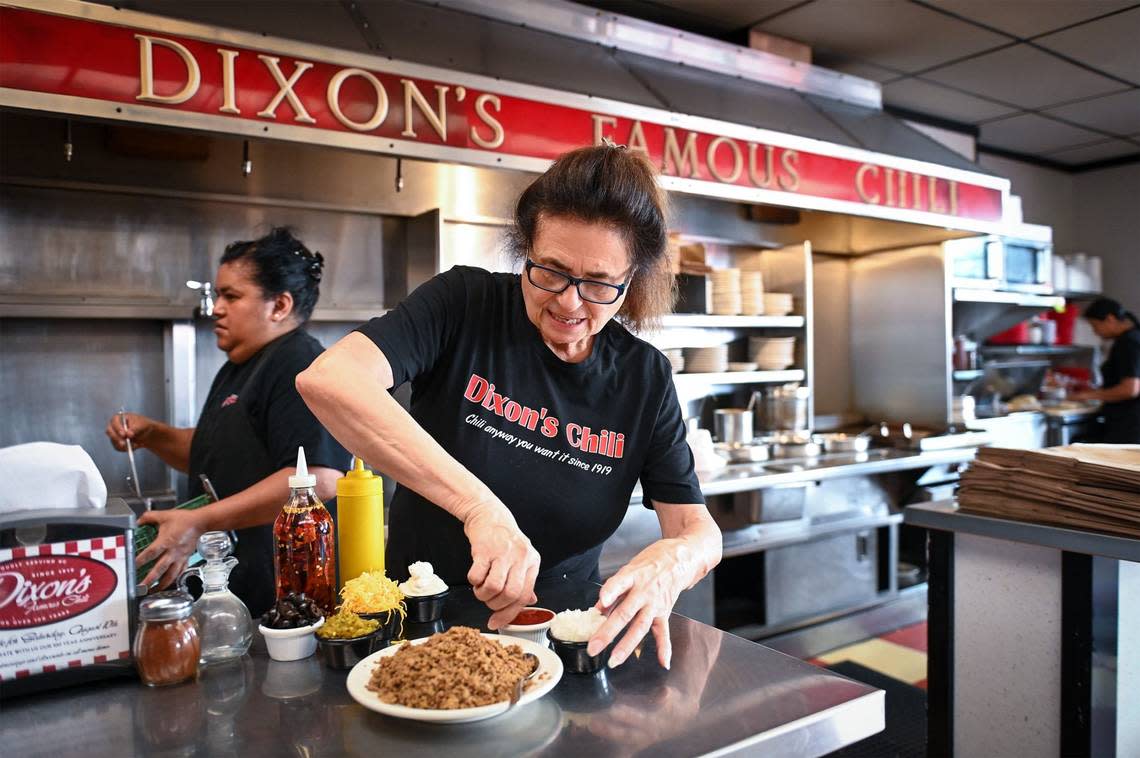 Manager Francine Graham bags up a to-go order at Dixon’s Famous Chili in Independence. The restaurant, a favorite of President Harry S. Truman, has been serving up chili since 1919. Graham has been working there for 36 years.