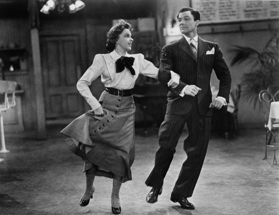 Judy Garland dances with Gene Kelly in a scene from the film 'For Me And My Gal', 1942. (Photo by Metro-Goldwyn-Mayer/Getty Images)