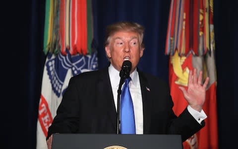 US President Donald J. Trump delivers remarks on America’s military involvement in Afghanistan at the Fort Myer military base in Arlington, Virginia, USA, 21 August 2017 - Credit: EPA