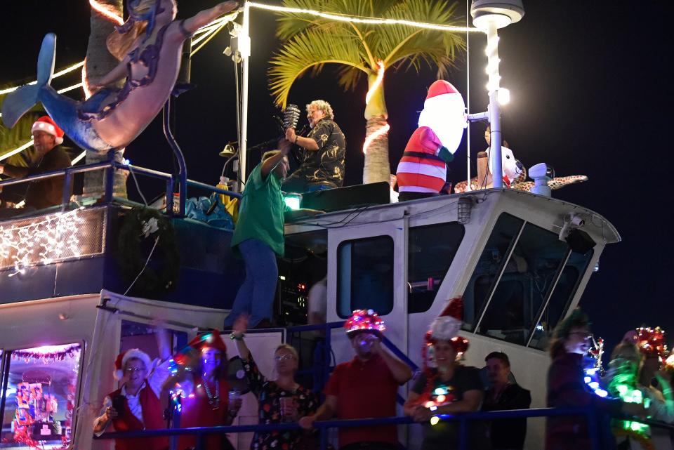 The Sarasota Holiday Boat Parade of Lights, pictured here in 2022, will return Dec. 9.