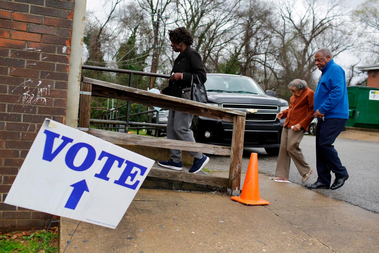 A voter enter a polling station at Floyd Middle Magnet School during the Democratic presidential primary in Montgomery, Alabama on Super Tuesday, March 3, 2020.