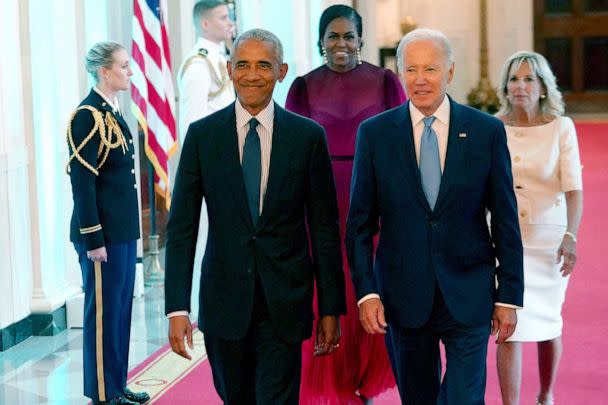 PHOTO: Former President Barack Obama and President Joe Biden arrive for a ceremony to unveil the Obama's official White House portraits, in the East Room of the White House in Washington, DC, on Sept. 7, 2022.  (Mandel Ngan/AFP via Getty Images)