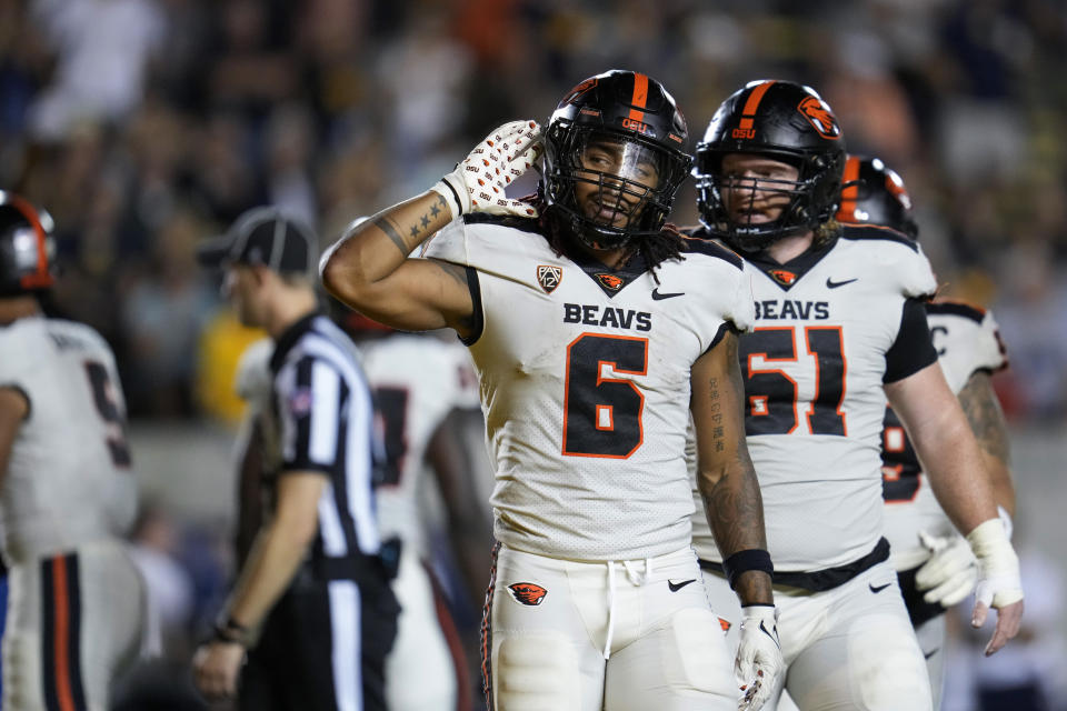 Oregon State running back Damien Martinez (6) celebrates after scoring a touchdown against California during the second half of an NCAA college football game Saturday, Oct. 7, 2023, in Berkeley, Calif. (AP Photo/Godofredo A. Vásquez)