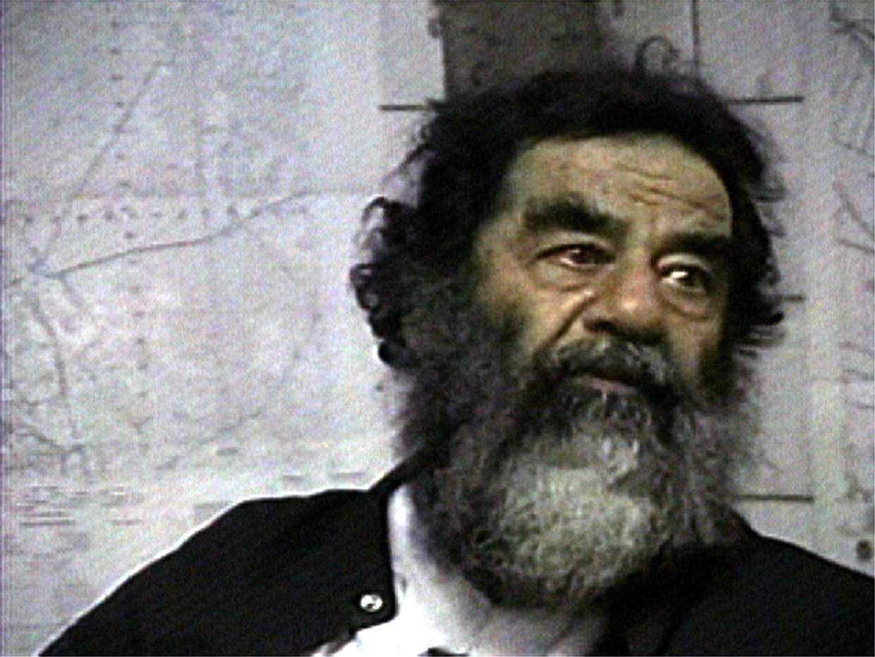 Captured former Iraqi leader Saddam Hussein is shown in this Dec. 14, 2003, file image from television footage provided by the U.S. Department of Defense.