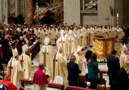 Cardinals arrive for the Easter vigil Mass led by Pope Francis in Saint Peter's Basilica at the Vatican, April 20, 2019. REUTERS/Remo Casilli