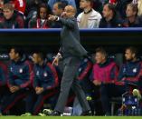 Bayern Munich's coach Pep Guardiola gestures during their Champions League group D first leg soccer match against CSKA Moscow in Munich September 17, 2013. REUTERS/Michael Dalder (GERMANY - Tags: SPORT SOCCER)