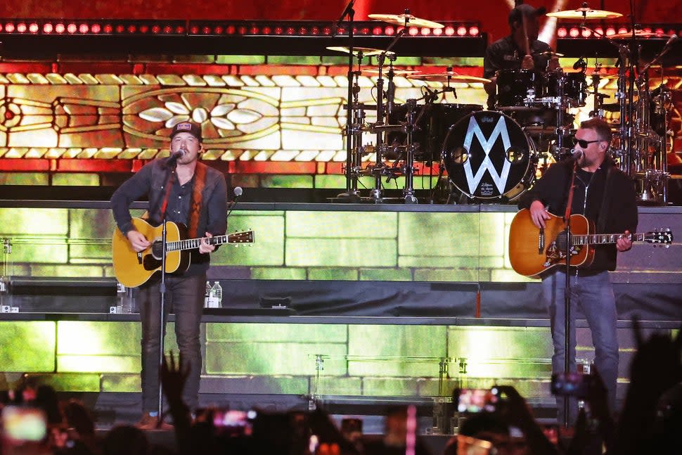 Morgan Wallen and Eric Church perform at the T-Mobile Mane Stage during the 2024 Stagecoach Festival at Empire Polo Club on April 28, 2024 in Indio, California.