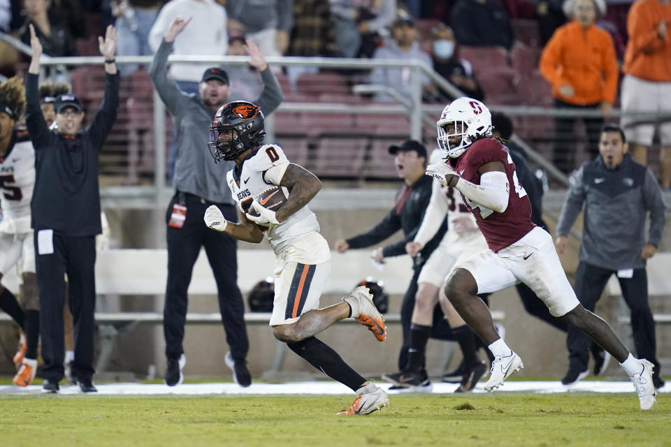 Oregon State wide receiver Tre'Shaun Harrison (0) runs after a catch for a 56-yard touchdown against Stanford during the second half of an NCAA college football game in Stanford, Calif., Saturday, Oct. 8, 2022. Oregon State won 28-27. (AP Photo/Godofredo A. Vásquez)