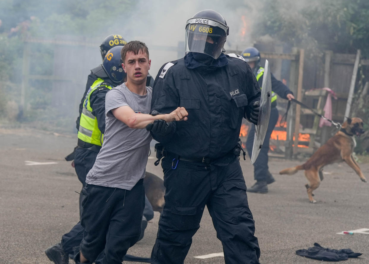 Police respond after far-right demonstrators attack a Rotherham hotel housing asylum seekers