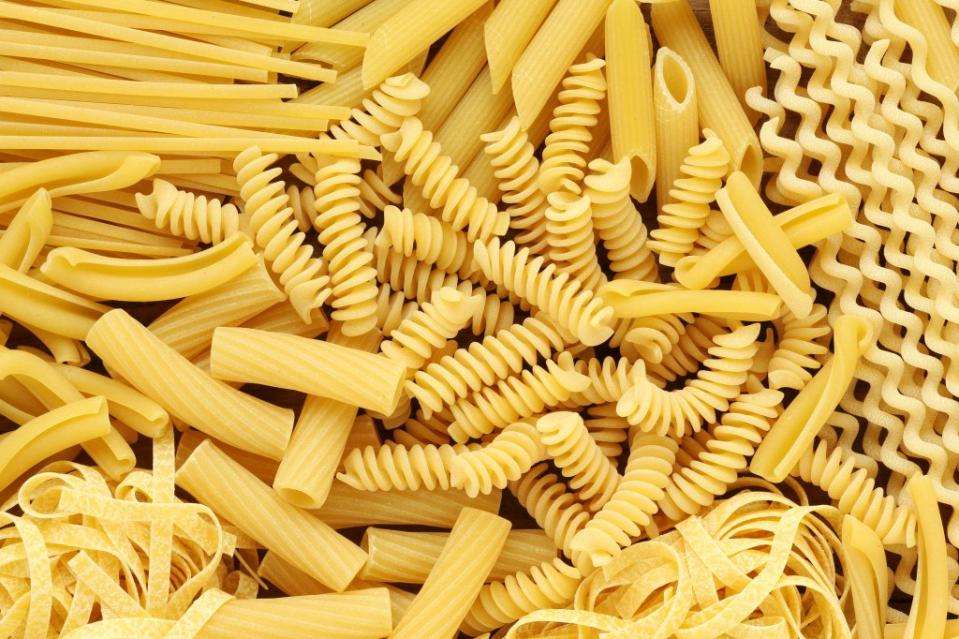 Carbohydrates like pasta and white bread break down into sugars while being chewed, she explained, making them worse for your teeth. kuvona – stock.adobe.com