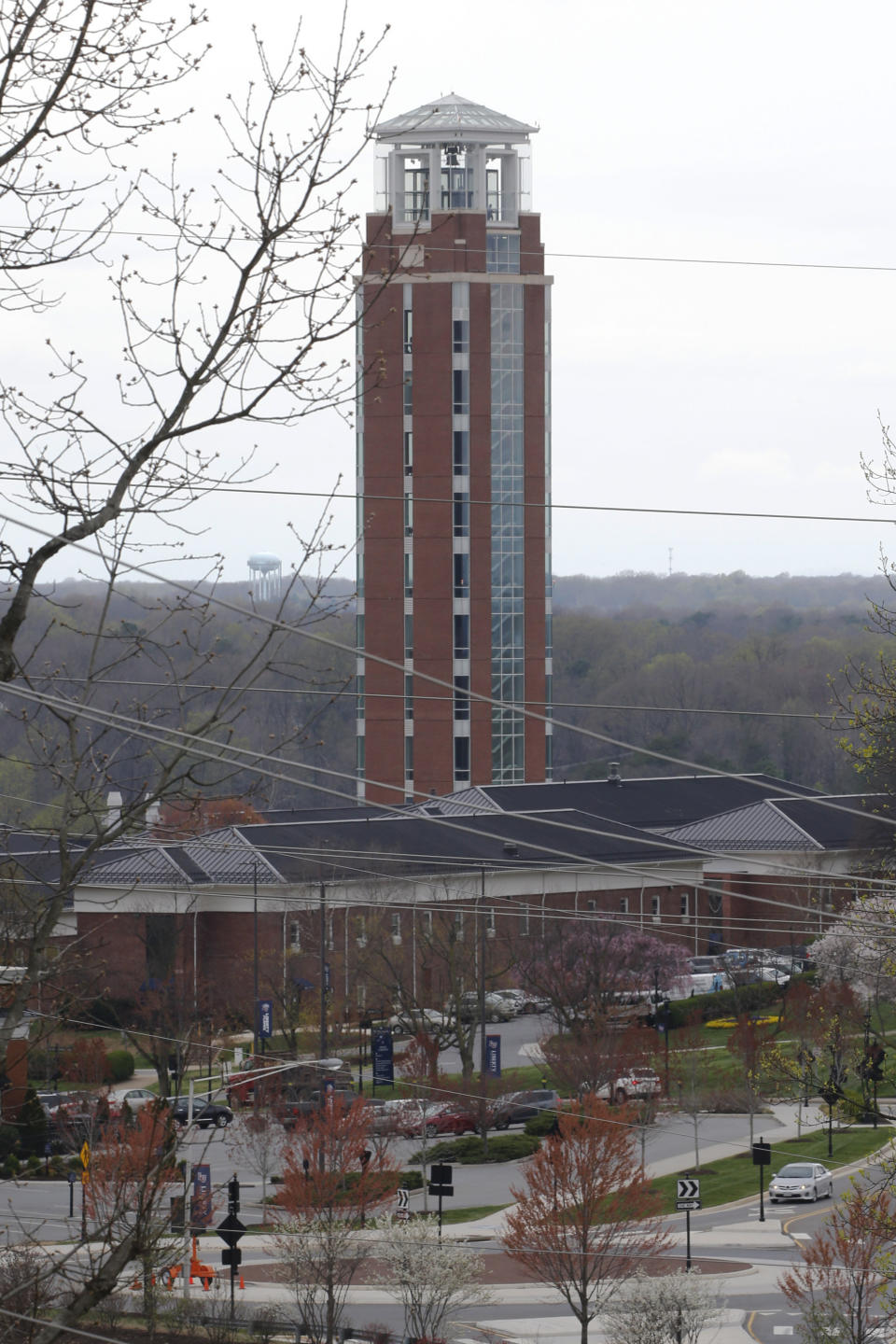 FILE - This March 24, 2020 file photo shows Liberty University's Freedom Tower in Lynchburg, Va. On Aug. 7, 2020, Jerry Falwell Jr. stepped down, at least temporarily, from his role as the president of the school. (AP Photo/Steve Helber, File)