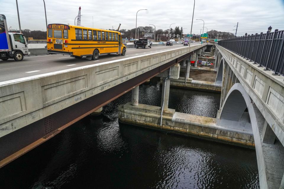 The southern span of the Washington Bridge now carries two lanes of westbound traffic along with eastbound traffic while the northern span is closed. The bicycle and pedestrian span is at right.