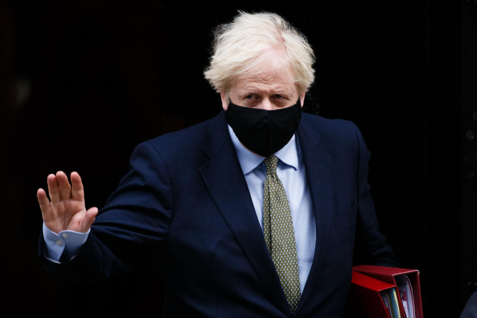 British Prime Minister Boris Johnson leaves 10 Downing Street wearing a face mask on his way to Prime Minister's Questions (PMQs) at the House of Commons in London, England, on October 14, 2020. (Photo by David Cliff/NurPhoto via Getty Images)