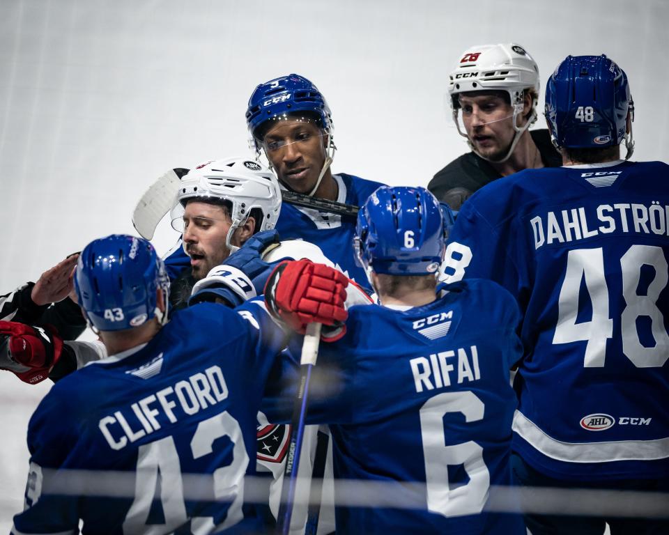 Utica Comets and Toronto Marlies players get into it at the Adirondack Bank Center in Utica on Friday, May 5, 2023. Toronto defeated Utica 4-1, eliminating the Comets from the playoffs.