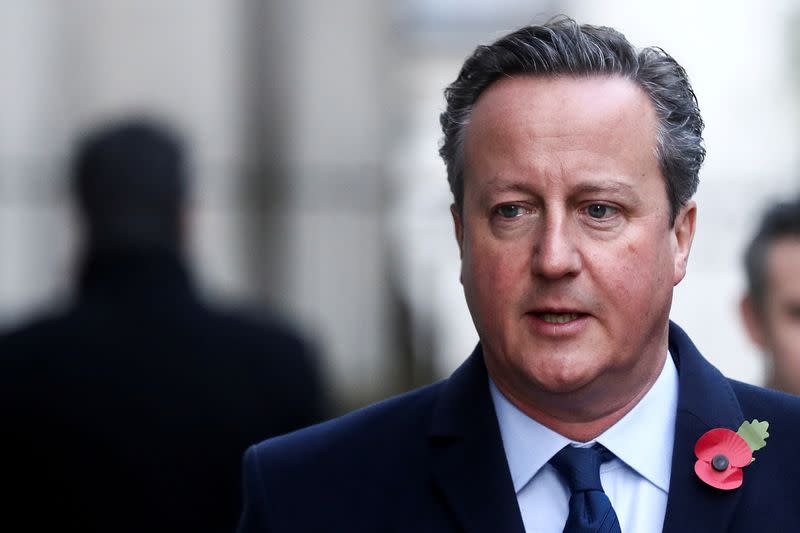 FILE PHOTO: Britain's former Prime Minister David Cameron arrives to attend the National Service of Remembrance, on Remembrance Sunday, at The Cenotaph in Westminster, London, Britain