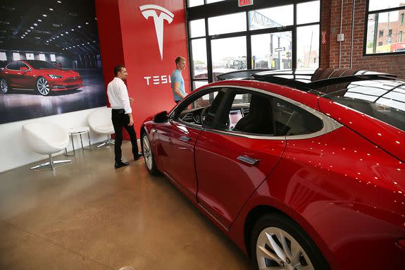A Tesla model S sits parked in a new Tesla showroom and service center in Brooklyn, New York, July 5, 2016.