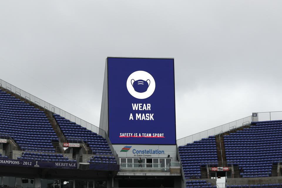 BALTIMORE, MARYLAND - NOVEMBER 01: A scoreboard reads 'Wear a Mask' as the Pittsburgh Steelers play the Baltimore Ravens at M&T Bank Stadium on November 1, 2020 in Baltimore, Maryland. The Baltimore allowed a limited number fans for the first time this season, as previously no fans were allowed due to the Covid-19 pandemic. (Photo by Patrick Smith/Getty Images)