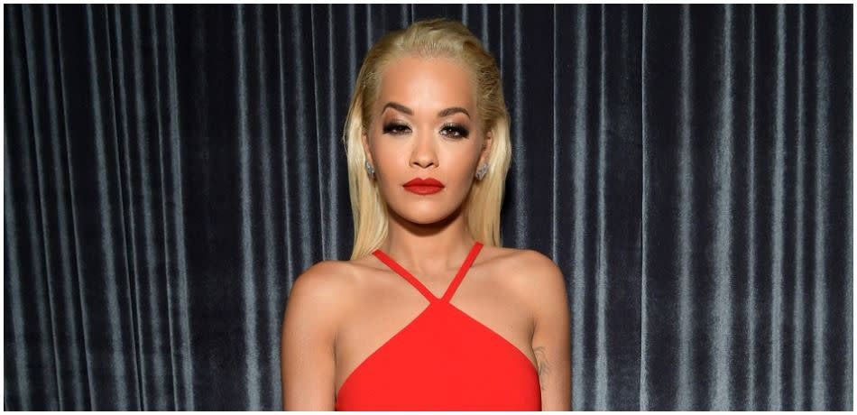 Rita Ora stuns in bright red dress.