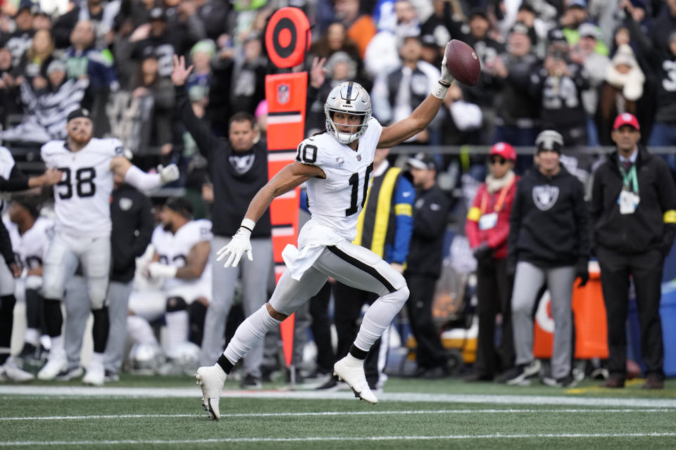 Las Vegas Raiders wide receiver Mack Hollins runs for a touchdown during the first half of an NFL football game against the Seattle Seahawks Sunday, Nov. 27, 2022, in Seattle. (AP Photo/Gregory Bull)