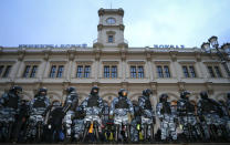 Police stand guard during a protest against the jailing of opposition leader Alexei Navalny in Moscow, Russia, on Sunday, Jan. 31, 2021. Chanting slogans against President Vladimir Putin, thousands of people took to the streets Sunday across Russia's vast expanse to demand the release of jailed opposition leader Alexei Navalny, keeping up the nationwide protests that have rattled the Kremlin. (AP Photo/Alexander Zemlianichenko)