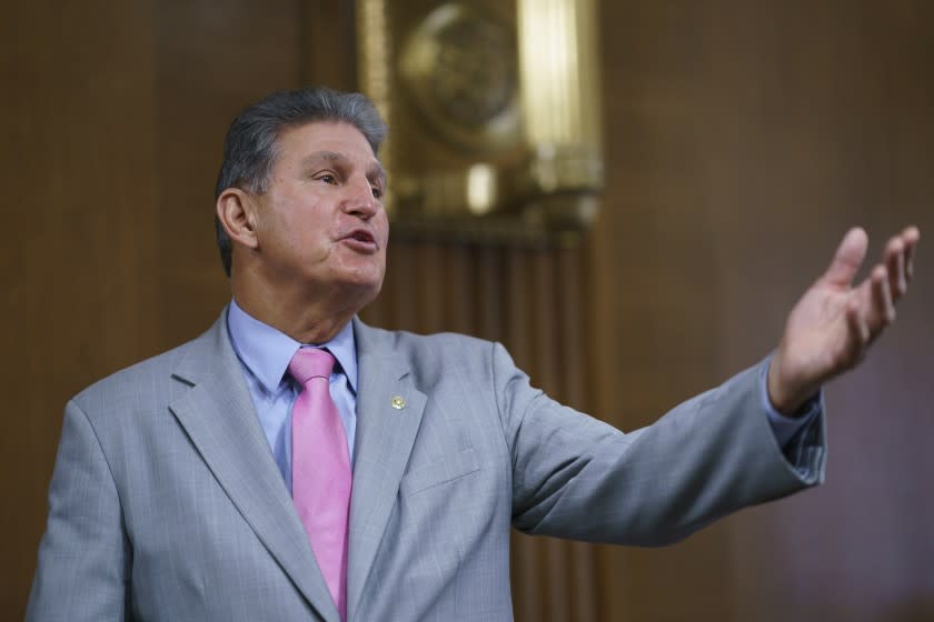 Sen. Joe Manchin, D-W.Va., chair of the Senate Energy and Natural Resources Committee, arrives to hold a confirmation hearing for Tommy Beaudreau of Alaska, to be deputy secretary of the Department of the Interior, at the Capitol in Washington, Thursday, April 29, 2021. (AP Photo/J. Scott Applewhite)