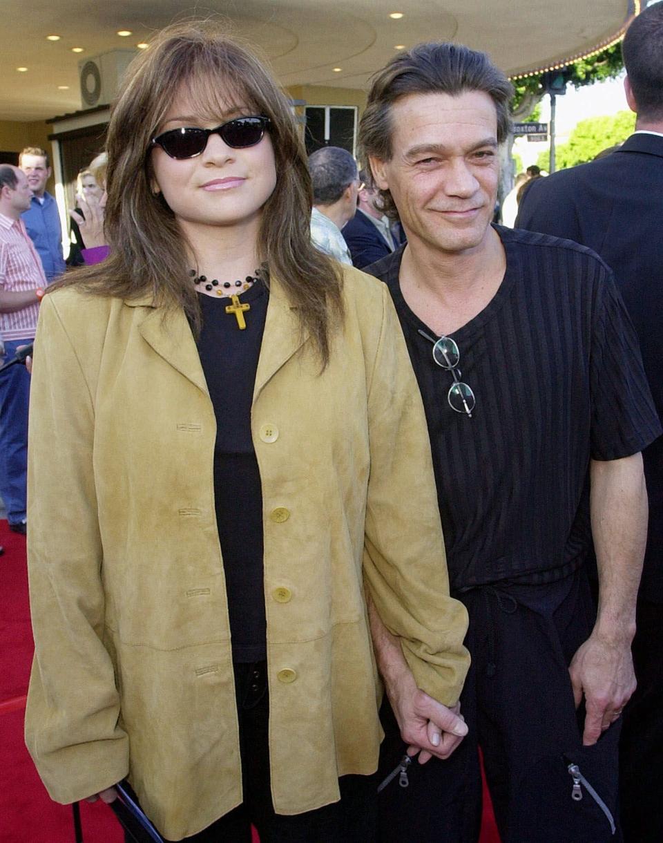 FILE - Valerie Bertinelli, left, arrives at the premiere of the film "America's Sweethearts" with husband Eddie Van Halen in Los Angeles on July 17, 2001. Van Halen, who had battled cancer, died Tuesday, Oct. 6, 2020. He was 65. (AP Photo/Kevork Djansezian, File)