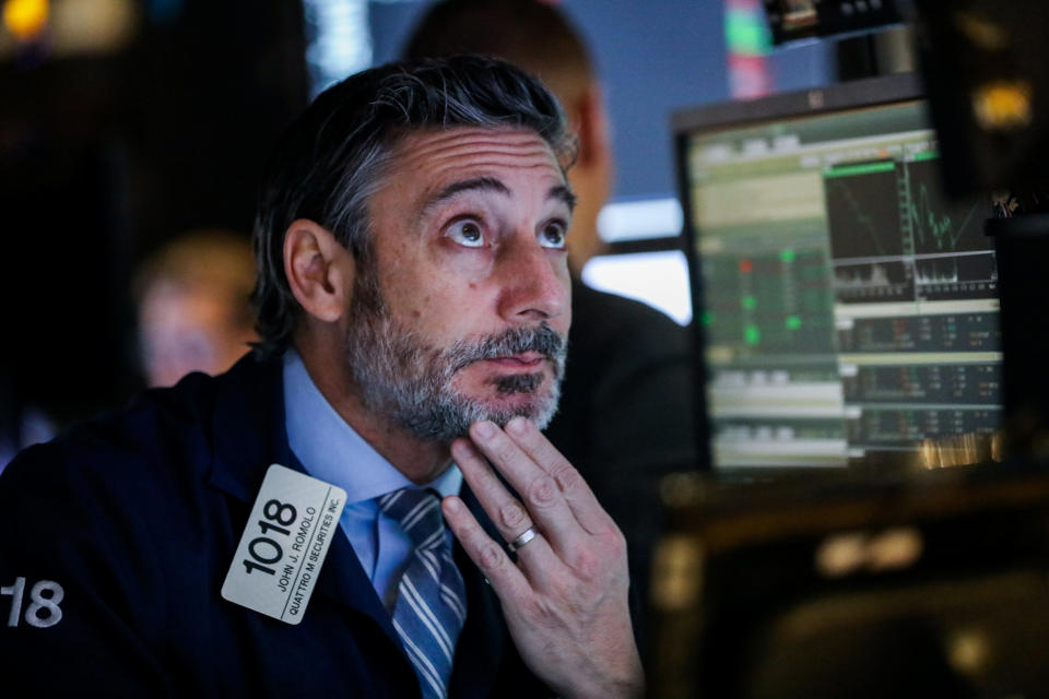 Traders work on the floor of the New York Stock Exchange (NYSE) in New York, U.S., December 26, 2018. REUTERS/Jeenah Moon