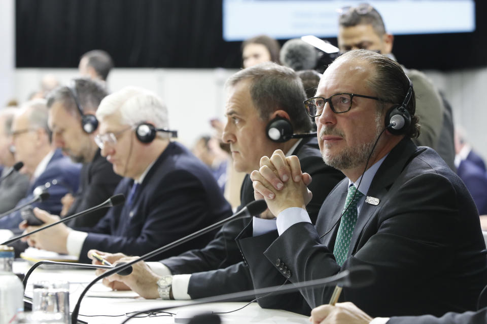 Austria's foreign minister Alexander Schallenberg, right, attends the plenary session of the OSCE (Organization for Security and Co-operation in Europe) Ministerial Council meeting, in Skopje, North Macedonia, on Thursday, Nov. 30, 2023. (AP Photo/Boris Grdanoski)