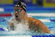 Michael Andrew participates in the Men's 100 Breaststroke during wave 2 of the U.S. Olympic Swim Trials on Monday, June 14, 2021, in Omaha, Neb. (AP Photo/Jeff Roberson)