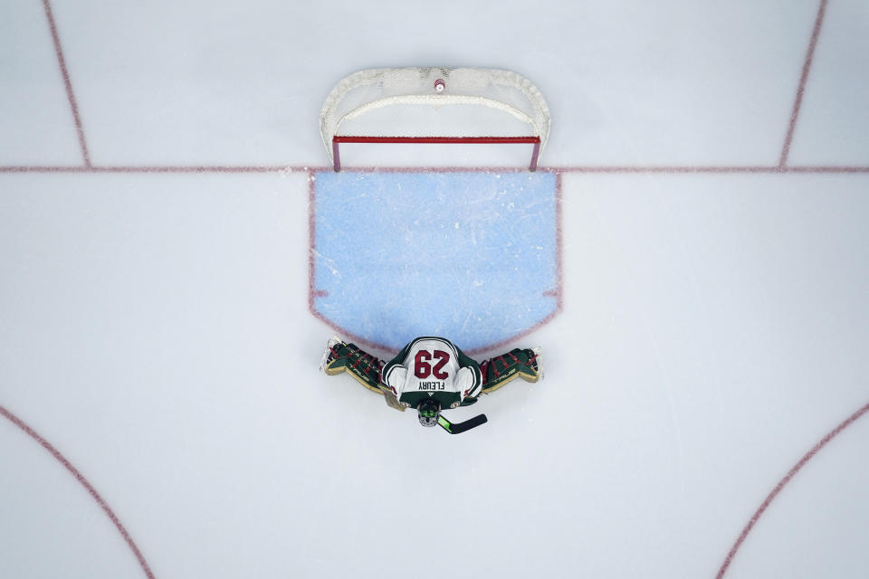 Minnesota Wild's Marc-Andre Fleury stretches during the second period of an NHL hockey game against the Philadelphia Flyers, Thursday, March 23, 2023, in Philadelphia. (AP Photo/Matt Slocum)