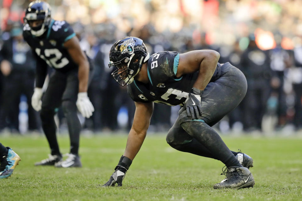 FILE - In this Oct. 28, 2018, file photo, Jacksonville Jaguars defensive end Calais Campbell (93) during the second half of an NFL football game at Wembley stadium in London, Sunday,. Armed with a new contract after being traded from Jacksonville to Baltimore, five-time Pro Bowl defensive end hopes to be a difference-maker in the Ravens' bid to reach the Super Bowl. (AP Photo/Matt Dunham, File)