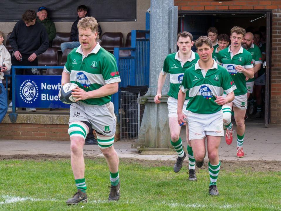 Salisbury Journal: Captain Luke Newton leads the team out for the last time this season. Picture by John Palmer