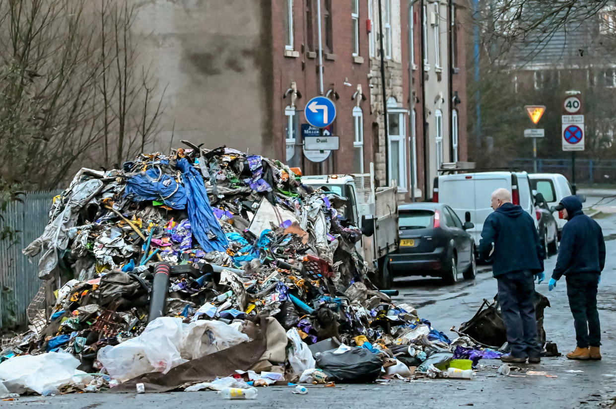 A pile of rubbish dumped on Bilhay Lane, West Bromwich, West Midlands, January 14, 2021.  A massive mountain of rubbish has been dumped on a West Midlands street leaving residents outraged.  See SWNS story SWMDrubbish.  The filthy heap was spotted blocking the road in Bilhay Lane, West Bromwich on wednesday afternoon (January 13).  Local residents have slammed it as âdisgustingâ and âa disgraceâ and called for CCTV to be installed in flytipping hotspots around the Sandwell borough.  Pictures and video taken at the scene showed the discarded waste was piled at least six feet high and is similar in size to a minibus.