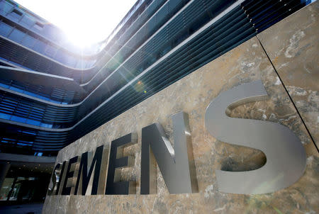 FILE PHOTO: FILE PHOTO: The Siemens AG headquarters is seen in Munich, Germany, June 14, 2016. REUTERS/Michaela Rehle/File Photo