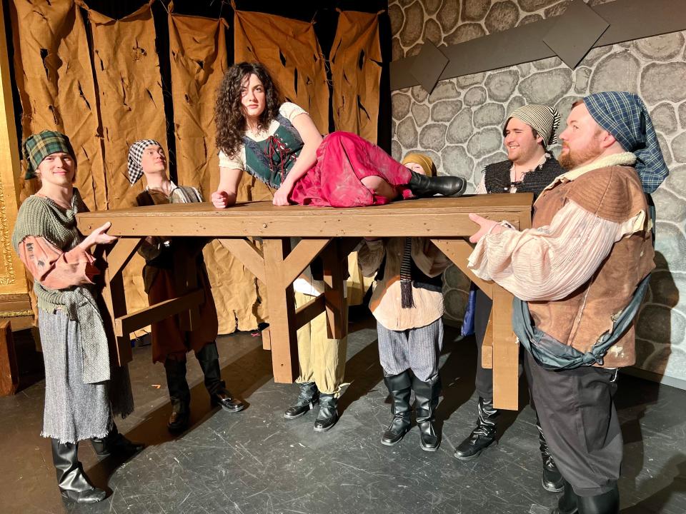 Aldonza (Hannah Starcher) is not impressed by Muleteers (from left) Alex Hazen, Aaron Shanor, Simon Burkhammer, Mikey Schrum in Center Theatre Players' "Man of La Mancha."