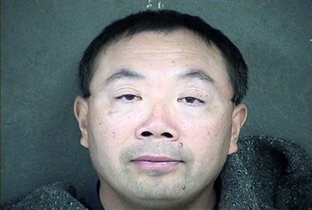 Zhang Weiqiang is shown in this Wyandotte County Detention Center handout photo released to Reuters December 12, 2013. REUTERS/Wyandotte County Detention Center